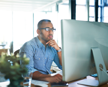 Cropped shot of a handsome young businessman working in his office