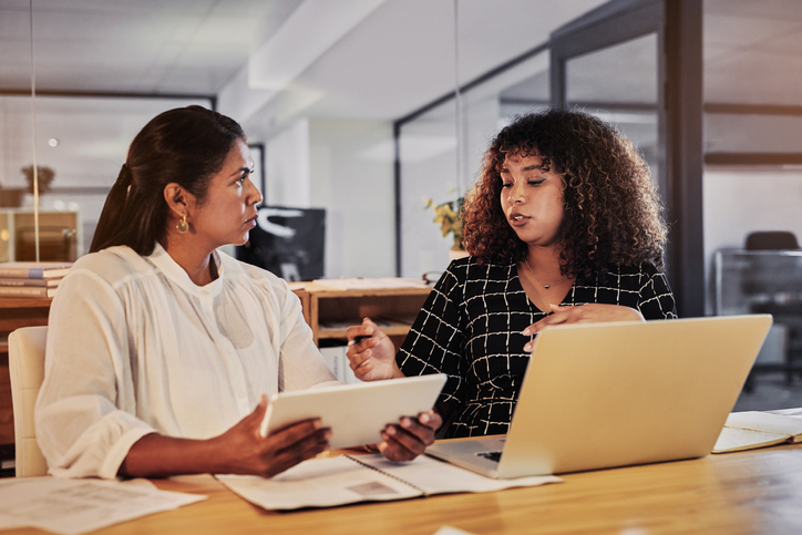 Two of business's best on the job